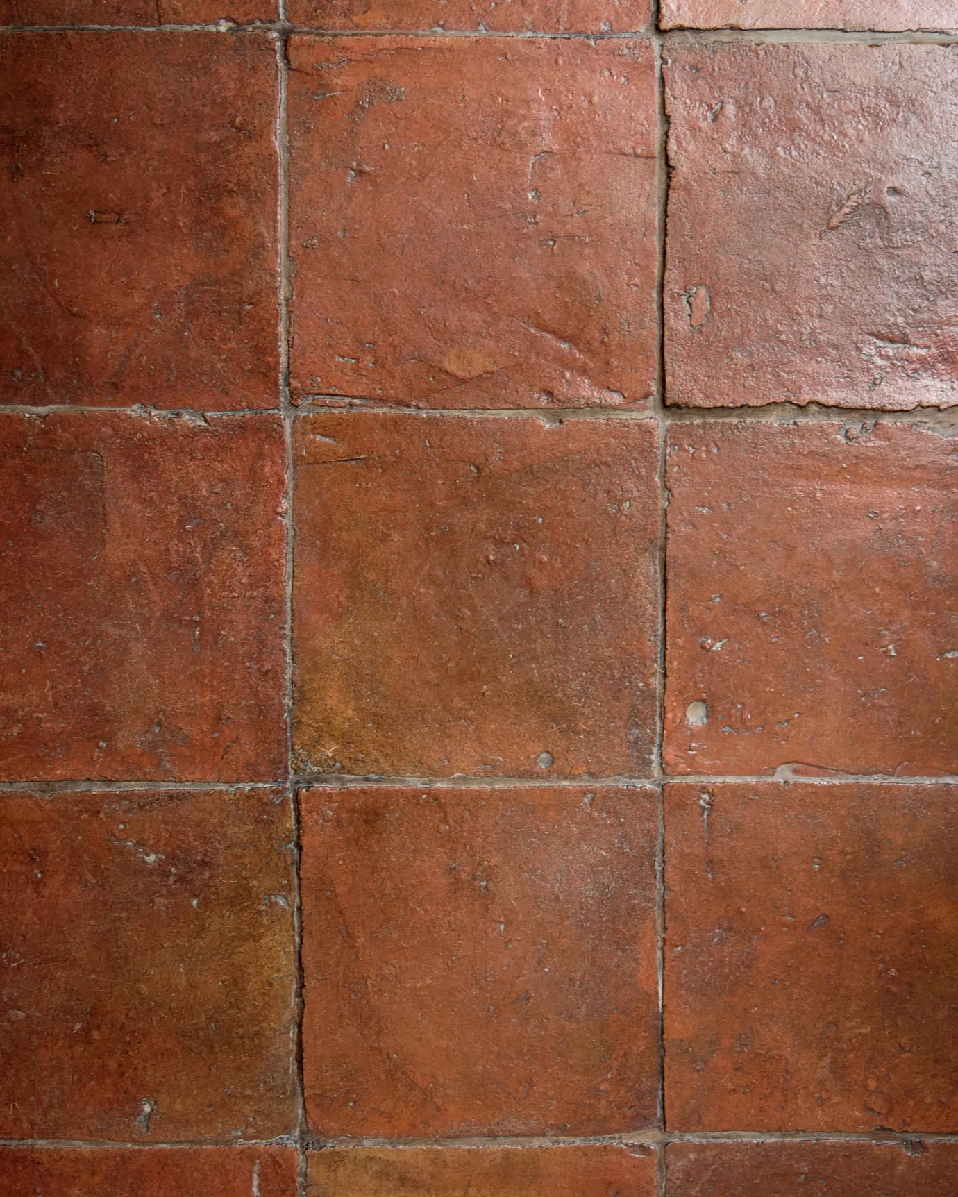 red terracotta square tiles